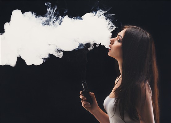 Vaping young woman