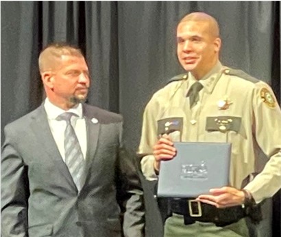 Deputy Stigall receiving graduation certificate 2 2 22