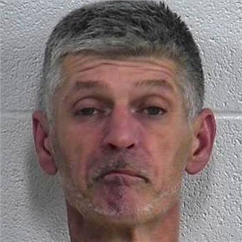 Wanted on four outstanding warrants, Shane Cope was arrested at crash scene in Laurel County, KY