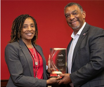 Dr. Aaron Thompson, right, received the Wendell Thomas Award from Dr. Michelle Jones, nomination/award coordinator for KABHE, left, during the organization's recent annual conference. images3/NEWS_PICS/Aaron_Thompson-Michelle_Jones.jpg: https://www.clayconews.com/