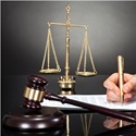 Judge signing document 125